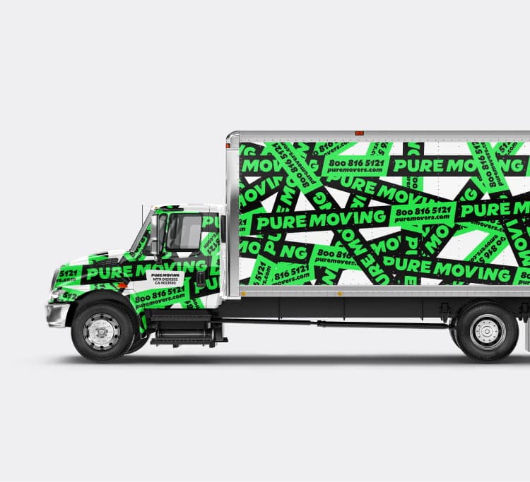 A green and black Pure Moving branded truck, featuring contact information and the website displayed on the side, embodies the values shared in our About Us section. About