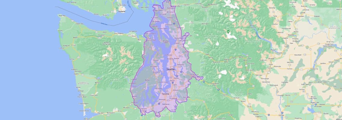 A map highlighting the Seattle metropolitan area in purple, showing the surrounding geographical features, cities, and road networks in the Pacific Northwest region of the United States. Seattle Movers