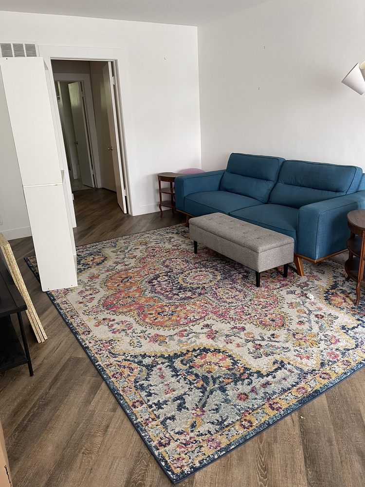 Living room setup completed after residential moving service