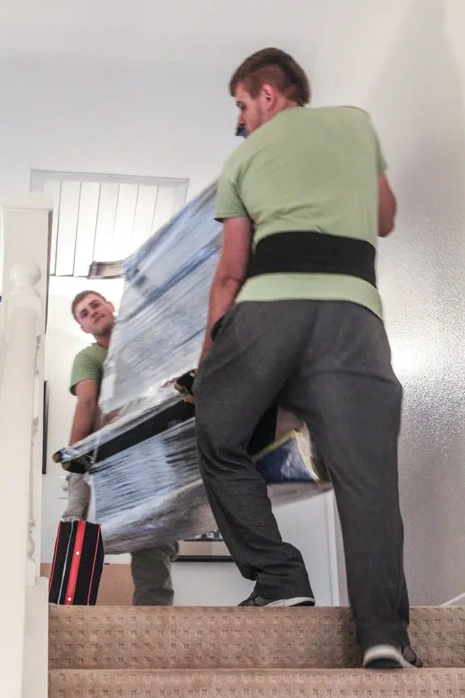 2026 01 puremovers.com lifestyle upstairs furniture move v1