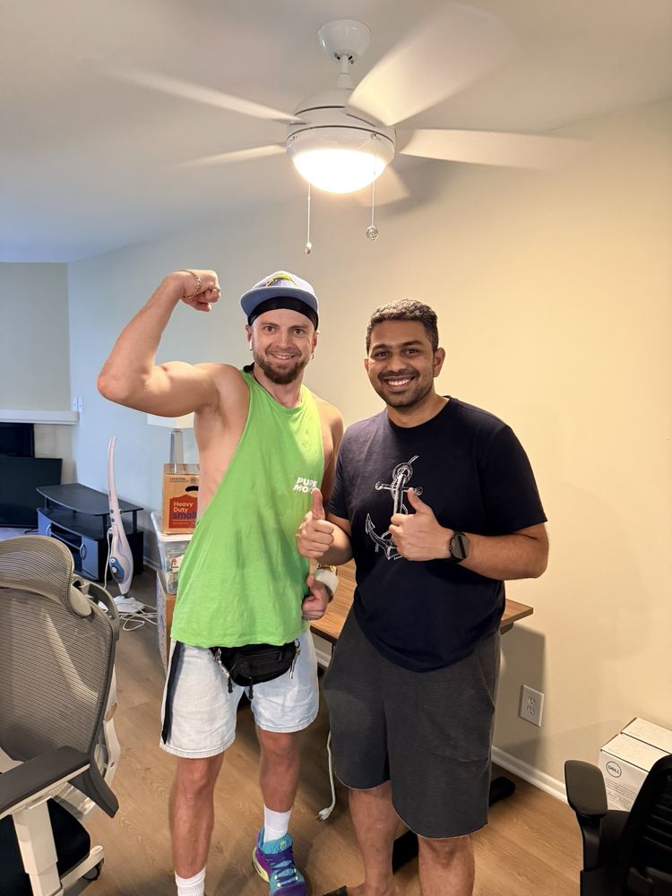 Best moving company mover posing during organized residential move