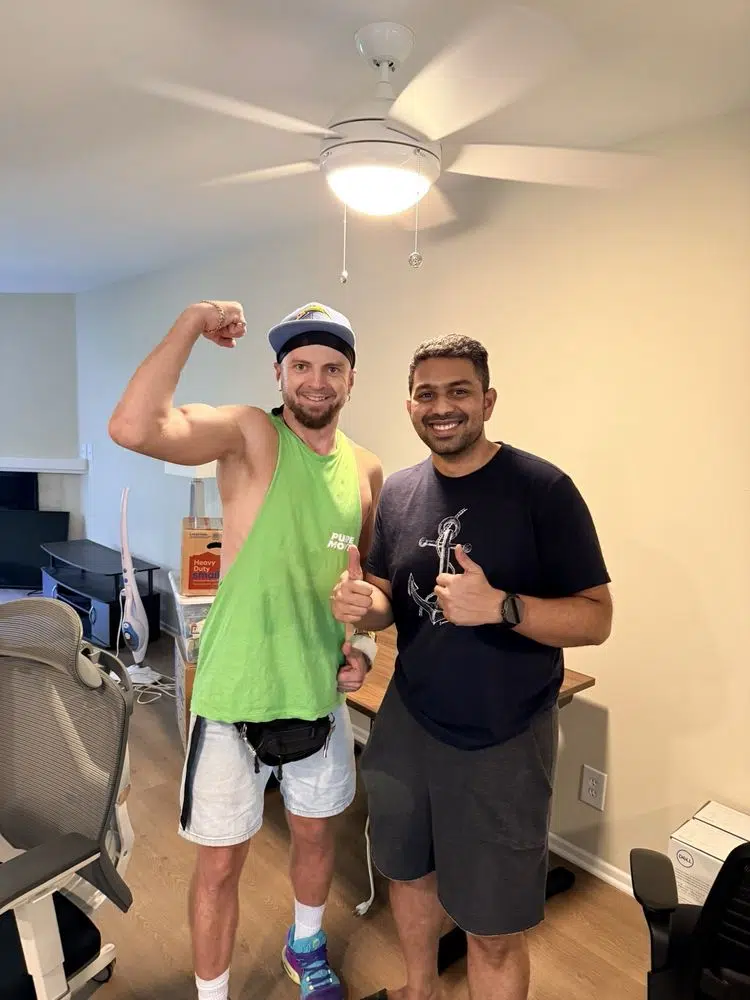 Best moving company mover posing during organized residential move